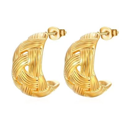 Boucles d'oreilles en or et en argent avec fixation à vis en finition placée