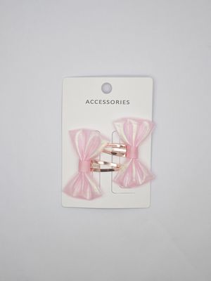 Des bandes à cheveux brodées, des pinces, des scrunchies, des accessoires brillants et amusants pour les filles.
