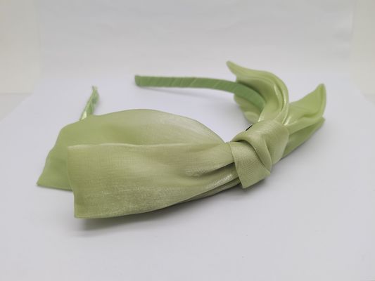 La bande de cheveux en tissu vert pour votre collection