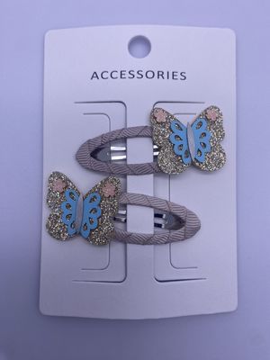 2 packs pour les enfants, des pinces à cheveux de papillons de différentes couleurs.